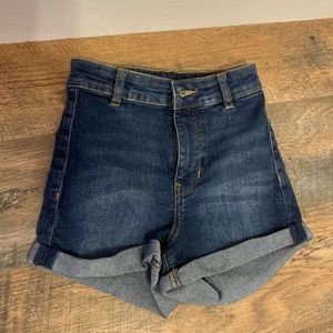 jean shorts from H&M bottoms roll up, high. two back pockets, no front pockets.